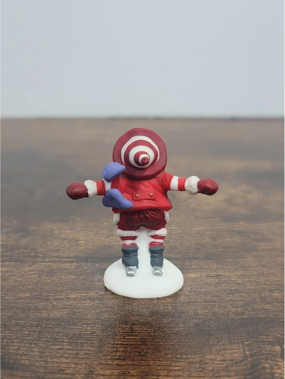 Department 56 Santa Figurine with Blue Scarf on Skates